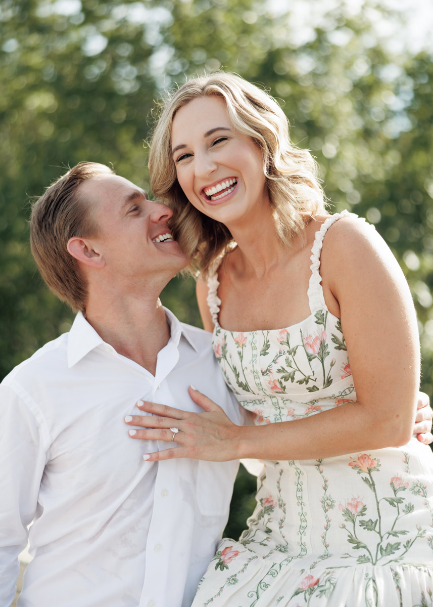 A couple celebrate their engagement in Buffalo Bayou Park, Houston