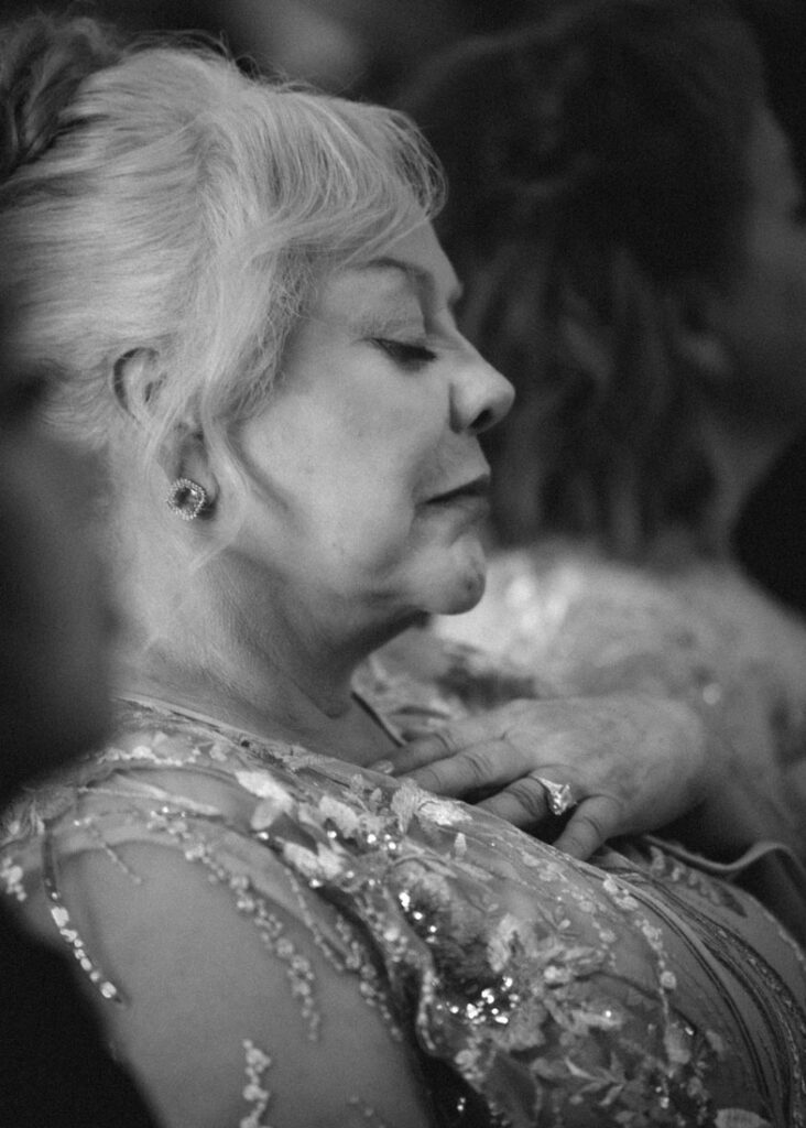 A grandmother gets emotional during the church ceremony in Houston