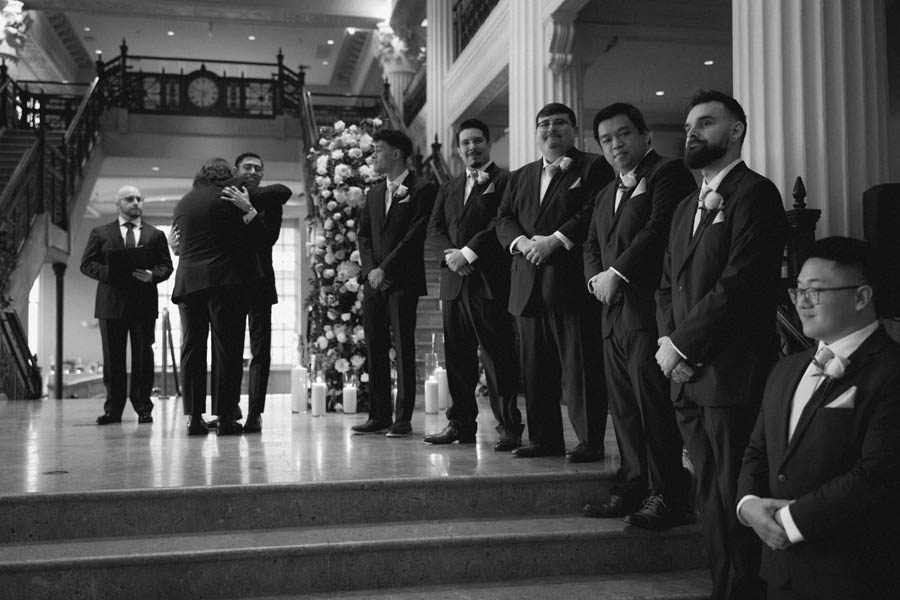 The best man hugs the groom