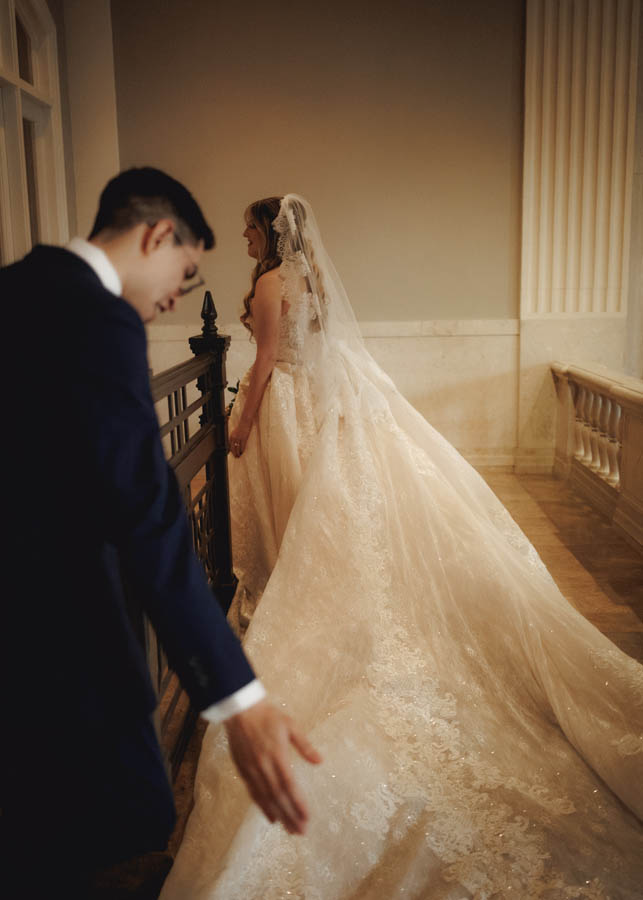 The groom helps with the cathedral train