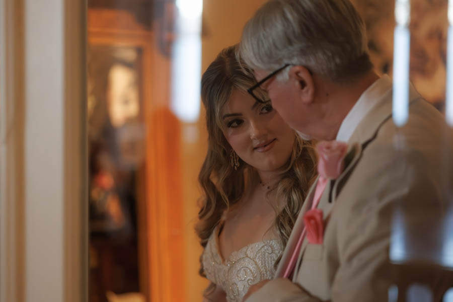 A moment with the bride and her father before they walk the aisle together