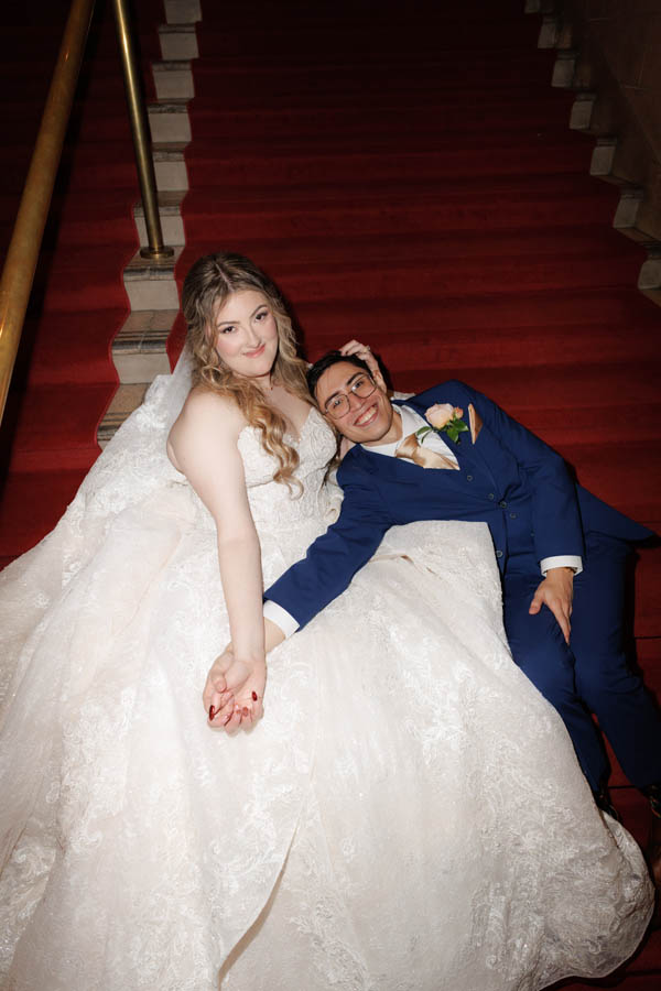 Bride and groom on the Corinthian staircase