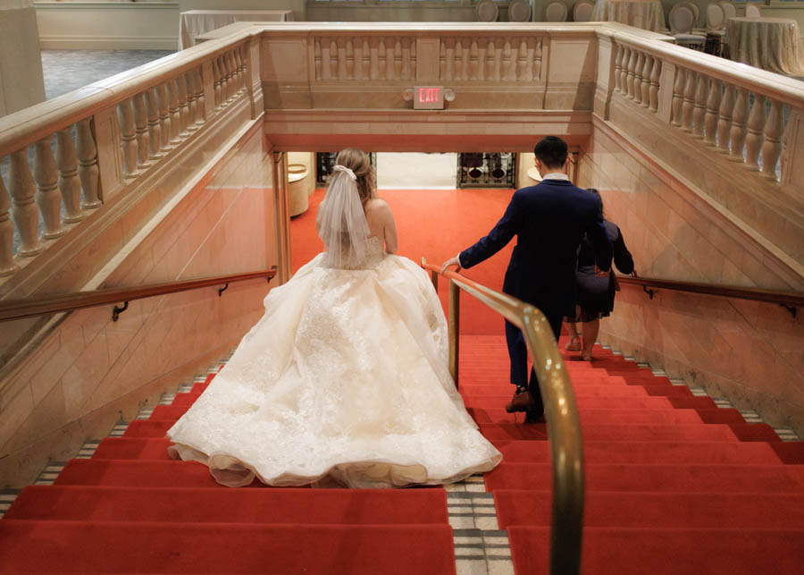 Bride and groom leaving the Corinthian via the staircase