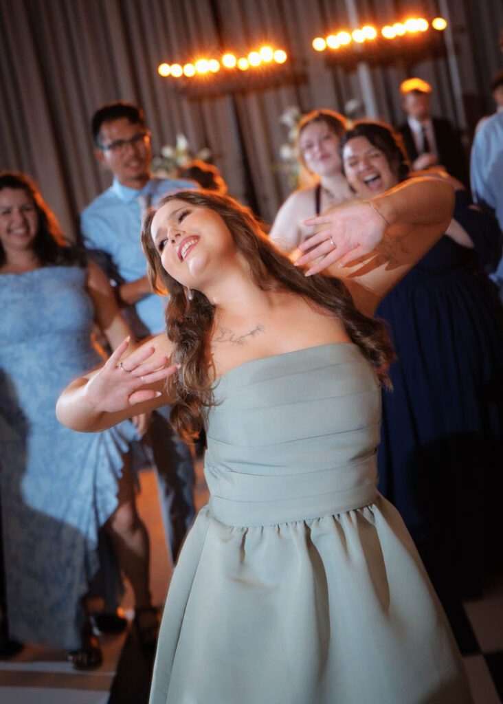 Guests dance at a wedding at Sandlewood Manor, Houston