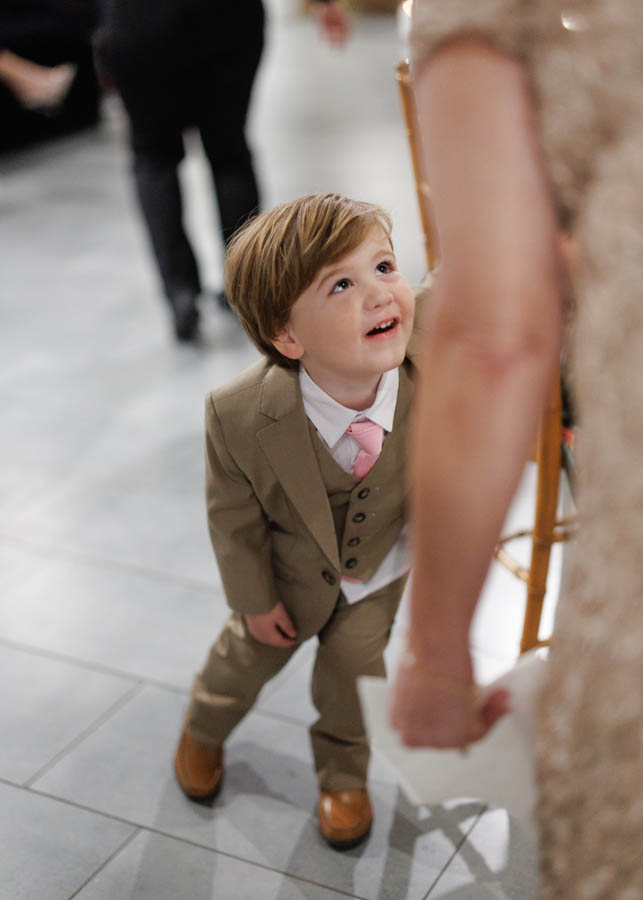 A young guest excited for the wedding