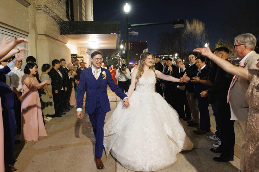 Bride and groom exit the Corinthian