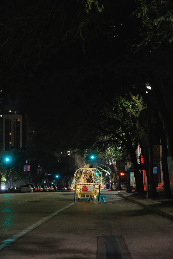 The horse drawn carriage leaves the Corinthian with the bride and groom