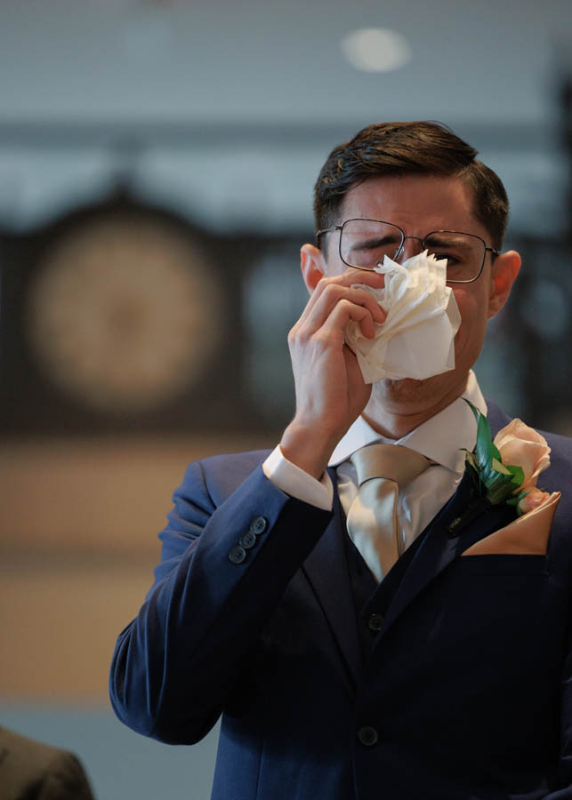 The groom cries tears of joy seeing his future wife