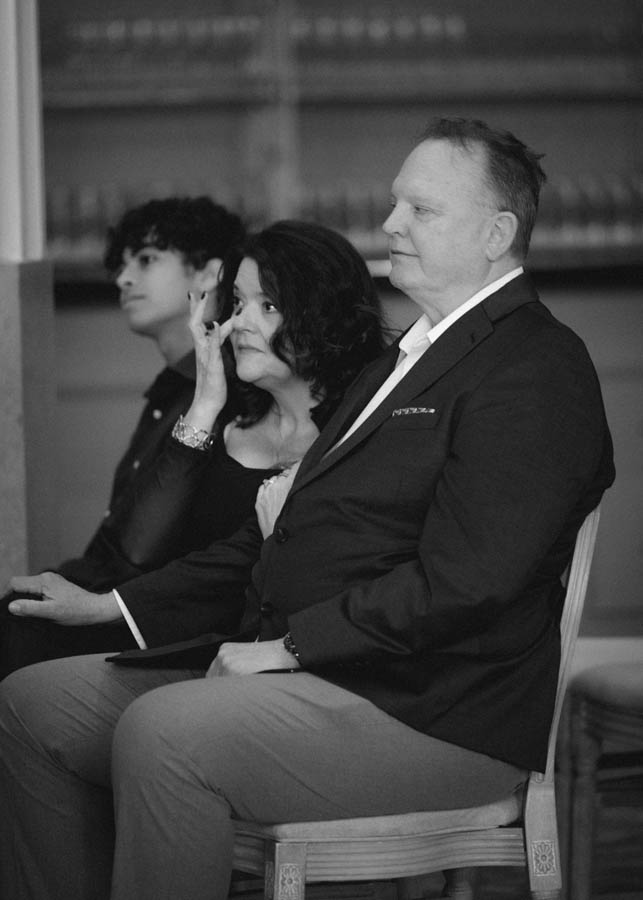 Emotional guests watch the ceremony