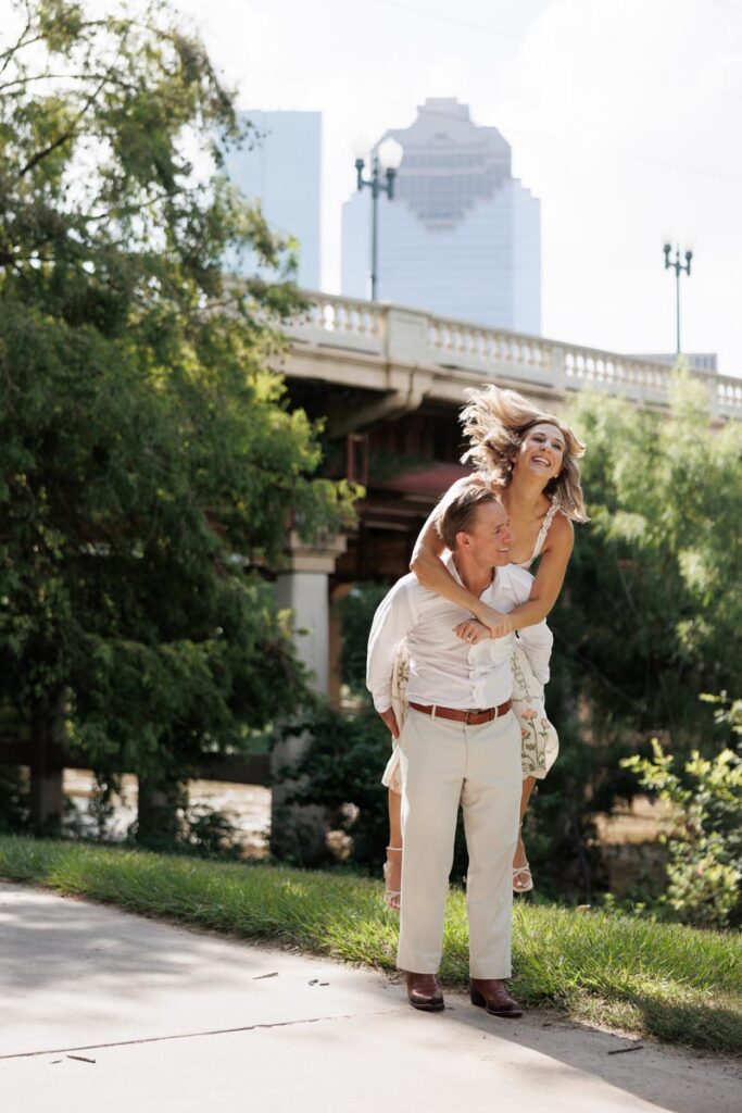 A joyous engagement photoshoot in Buffalo Bayou Park, Houston