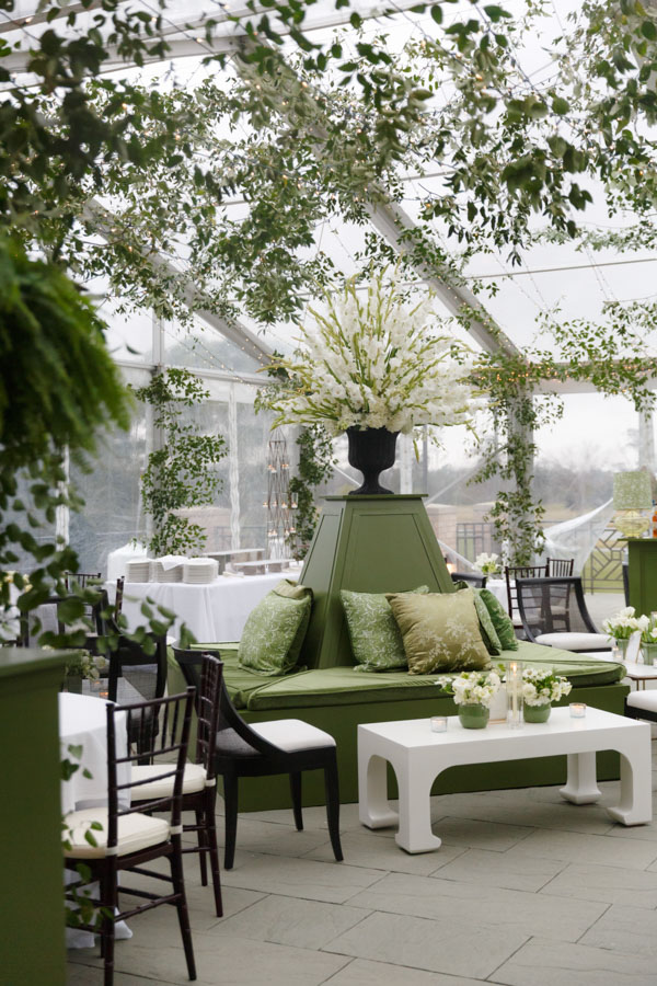 The outdoor reception space is beautifully designed and tented for a River Oaks Country Club wedding