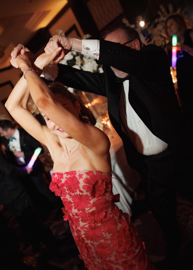 Wedding guests dancing in the ballroom at a Post Oak Hotel at Uptown Houston wedding