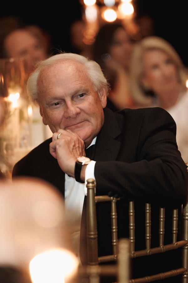 A guest listens to a speech at a Post Oak Hotel Houston wedding