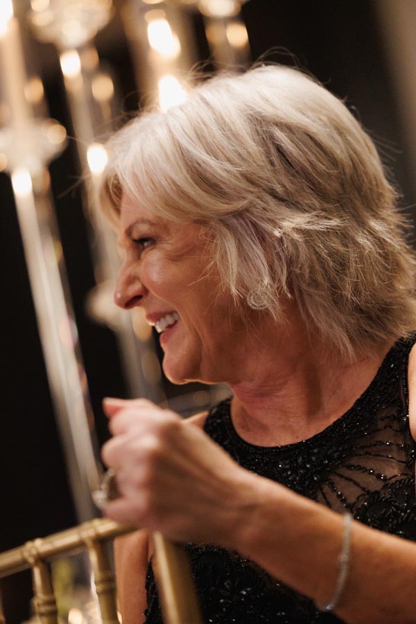 A guest laughs at the speech at a Post Oak Hotel at Uptown Houston wedding