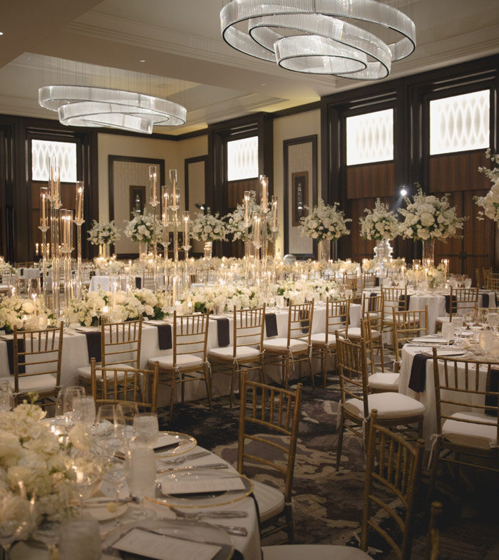 The ballroom at The Post Oak Hotel at Uptown Houston, elegantly set for a luxury, beautifully designed wedding reception