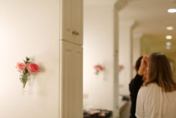 The bride in the hair and makeup chair at River Oaks Country Club