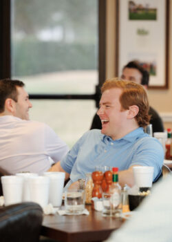 Groom laughs on the wedding morning