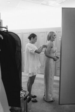Bride helps Mom get dressed
