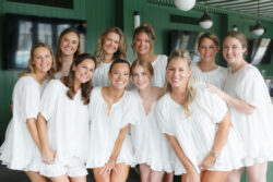 Bride and bridesmaids portrait in the bar at River Oaks Country Club, Houston