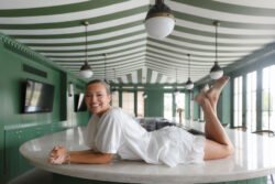 The bride lays on the bar on the morning of the wedding
