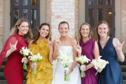 A bride and bridesmaids outside the country club