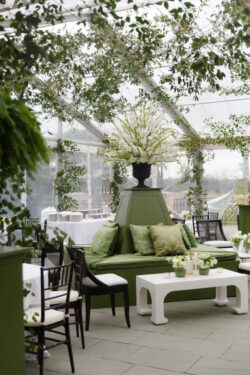 The outdoor reception space is beautifully designed and tented for a River Oaks Country Club wedding