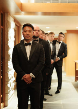 Groomsmen wait at the church