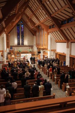 A wedding congregation at The Church of St. John the Divine, Houston