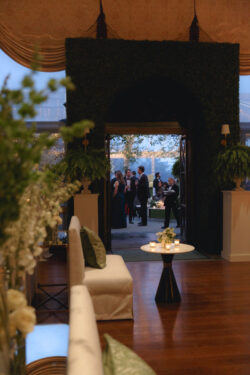 Wedding guests mingle outside