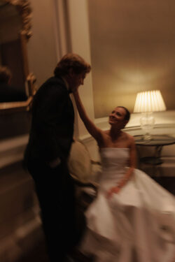 A motion blurred, shutter dragged artful portrait of the bride and groom
