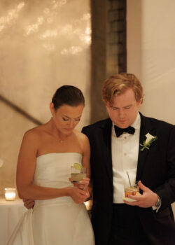 Bride and groom bow solemnly for prayer