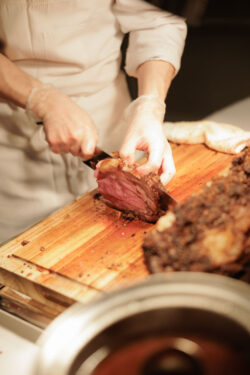 The chef prepares dinner