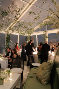An outdoor tent during a storm at a wedding in Houston
