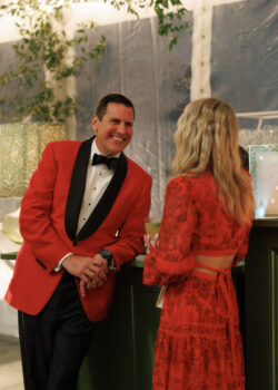 Guests chat at the outside bar