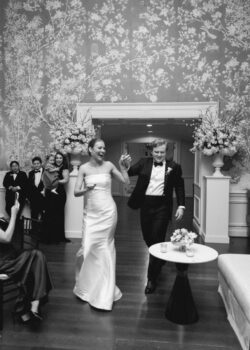 The Houston bride and groom make their evening entrance at River Oaks Country Club