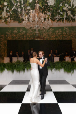 The bride and groom's first dance at River Oaks Country Club as Jordan Kahn Orchestra play