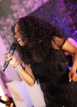 A singer from Jordan Kahn Orchestra at a wedding at River Oaks Country Club in Houston