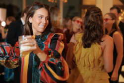 Guests dance at a River Oaks Country Club wedding reception in Houston, Texas