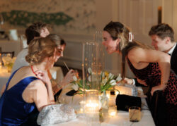 Wedding guests interact at River Oaks Country Club