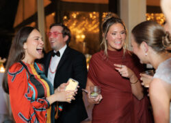 Guests laugh with the bride at ROCC
