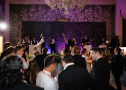 Guests party at River Oaks Country Club with Jordan Kahn Orchestra