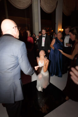 The bride dances on the custom dancefloor