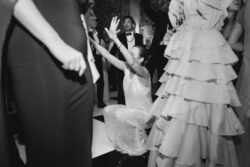 The bride dances among guests at River Oaks Country Club