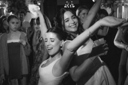 Guests dance at a wedding reception at Houston Country Club