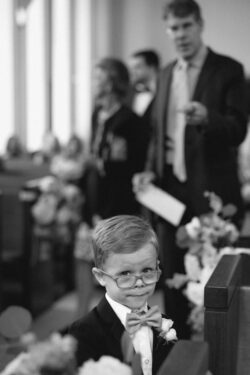 A young wedding guest in church