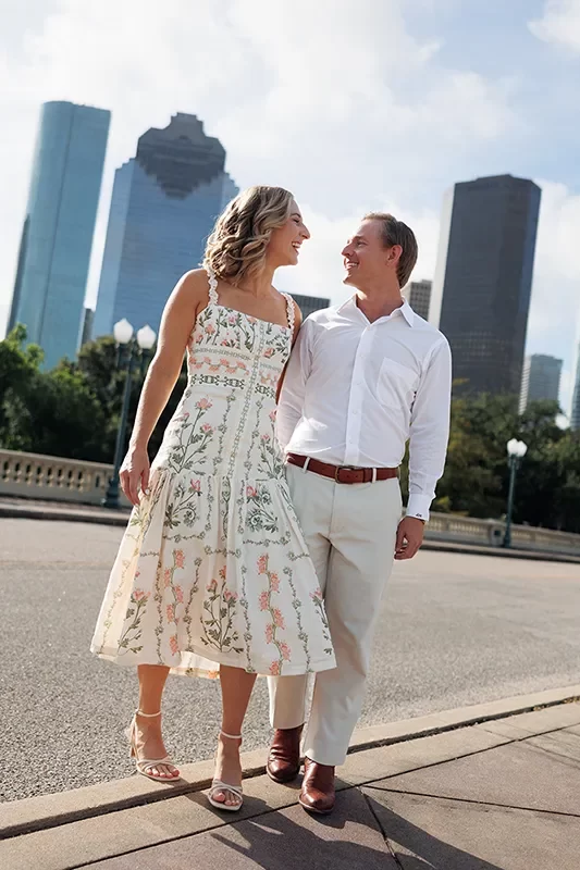 A couple's engagement session portrait on Sabine St Bridge in Houston Texas